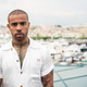 Illustration for article titled Vic Mensa responds to Chicago bait trucks by giving away thousands of shoes